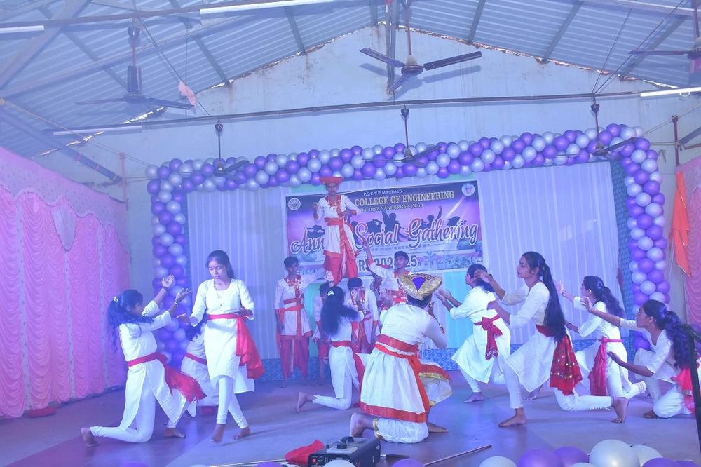 Group performance on stage at the Annual Social Gathering