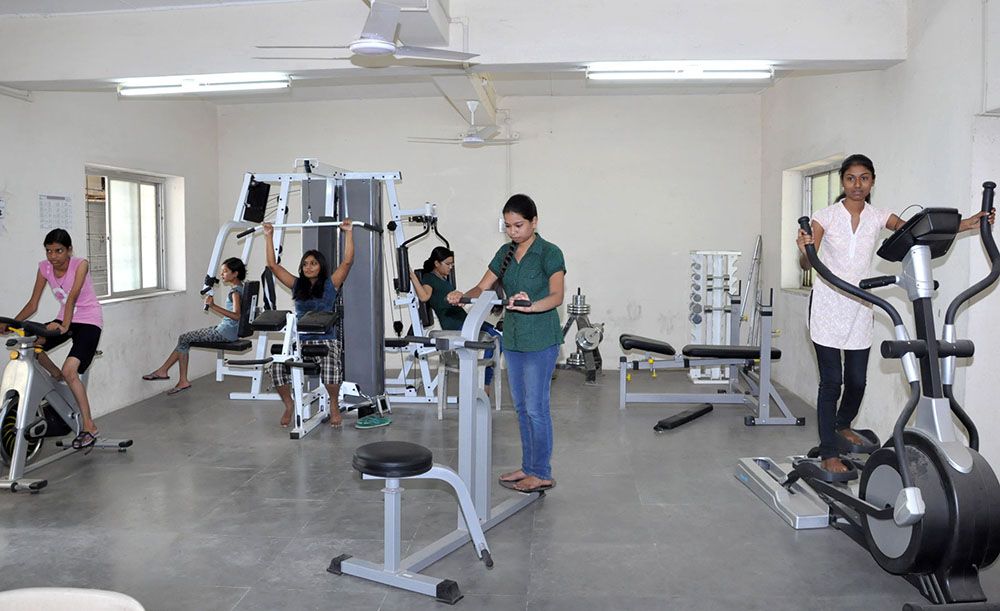 Gymnasium with cardio and weight machines