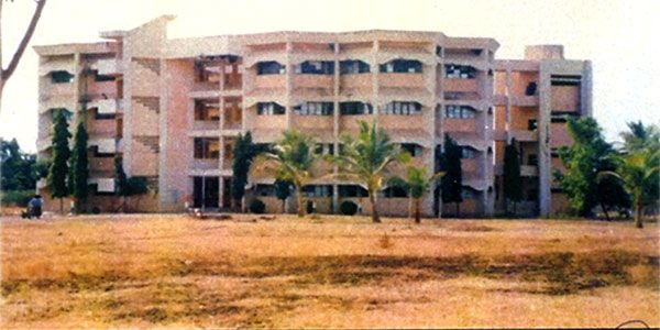 Boys' hostel building seen across open ground