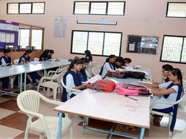Students studying at a library table